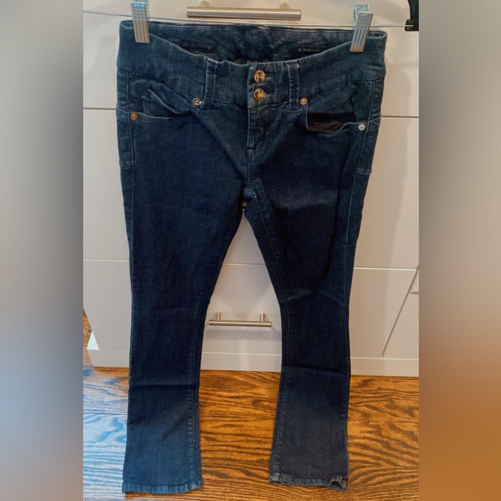 Cache slim boot cut jean